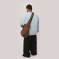 Load image into Gallery viewer, Loose-fit cotton twill cargo pants.
